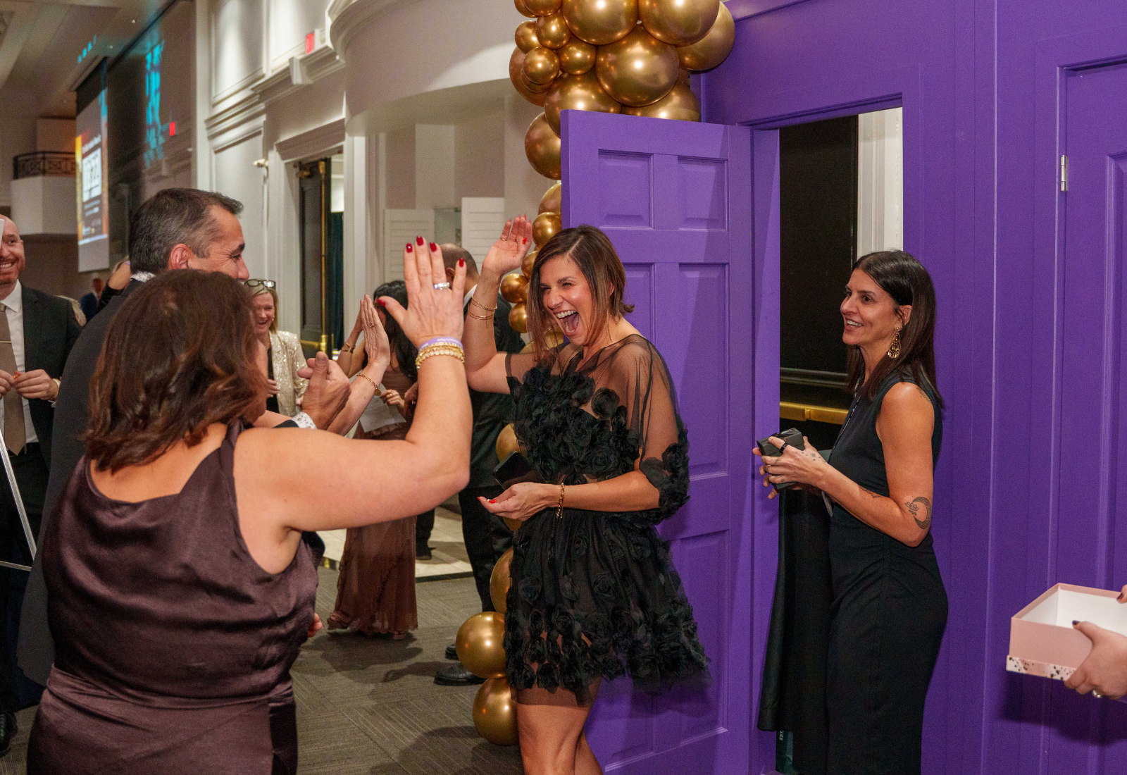 Guests enjoying a lively Butterfly Gala moment